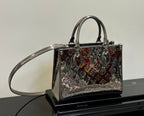 Louis Vuitton handbag with top handles and shoulder strap, black with multicolor patterned finish