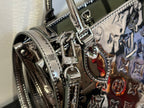 Louis Vuitton handbag strap attachment and side hardware, glossy multicolor patterned exterior