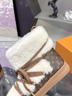 Louis Vuitton ladies faux-fur lace-up ankle boots, side close-up with brown monogram print