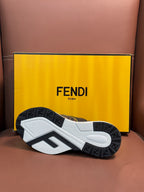 Fendi unisex sneaker outsole view, white tread with black FF logo pattern.
