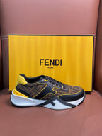 Fendi unisex sneakers, dark FF pattern with yellow trim and white sole, lace-up design.
