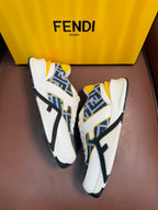 White FENDI sneakers with blue FF side panels, yellow lining, lace-up with chunky sole.