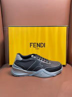 Fendi unisex sneakers, dark gray low-top lace-up with light gray panels and white midsole.