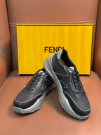 Fendi unisex sneakers, dark gray lace-up with light gray trim and thick white sole.