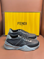 Fendi unisex sneakers, dark gray lace-up with light gray trim and chunky white sole.
