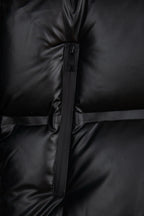 Prada long puffer jacket close-up of front zipper and quilted paneling