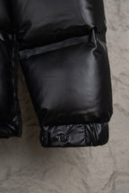 Prada long puffer jacket cuff with snap buttons on the lower sleeve