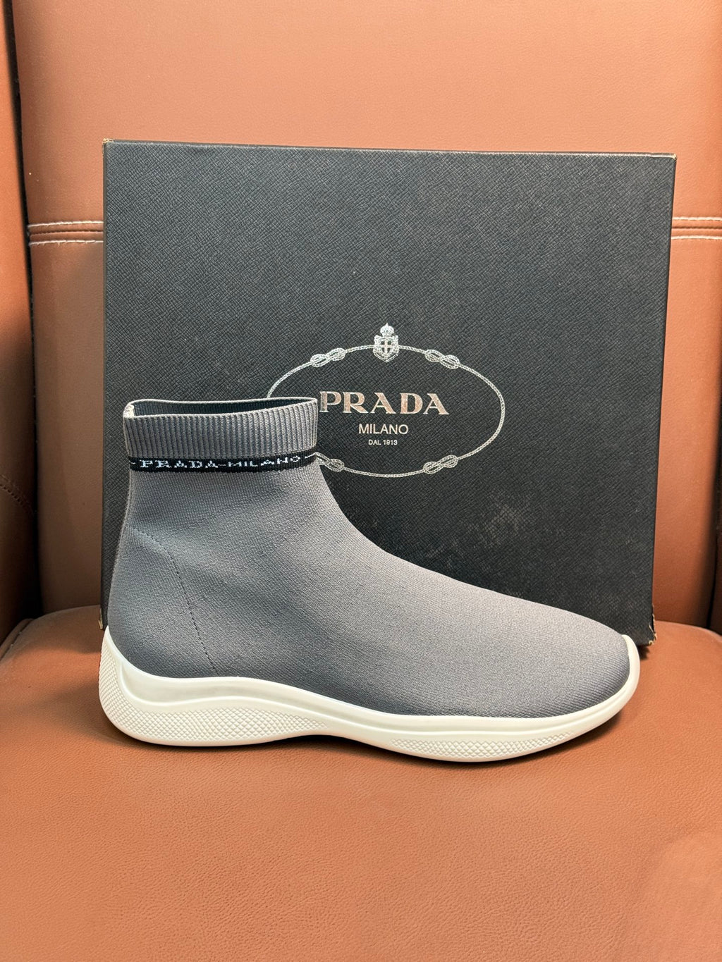 Prada unisex knit sock sneakers in light gray with branded elastic cuff detail
