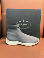 Prada unisex knit sock sneakers in light gray with branded elastic cuff detail