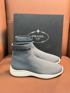 Prada unisex ankle sock sneakers in light gray with ribbed cuff and white sole