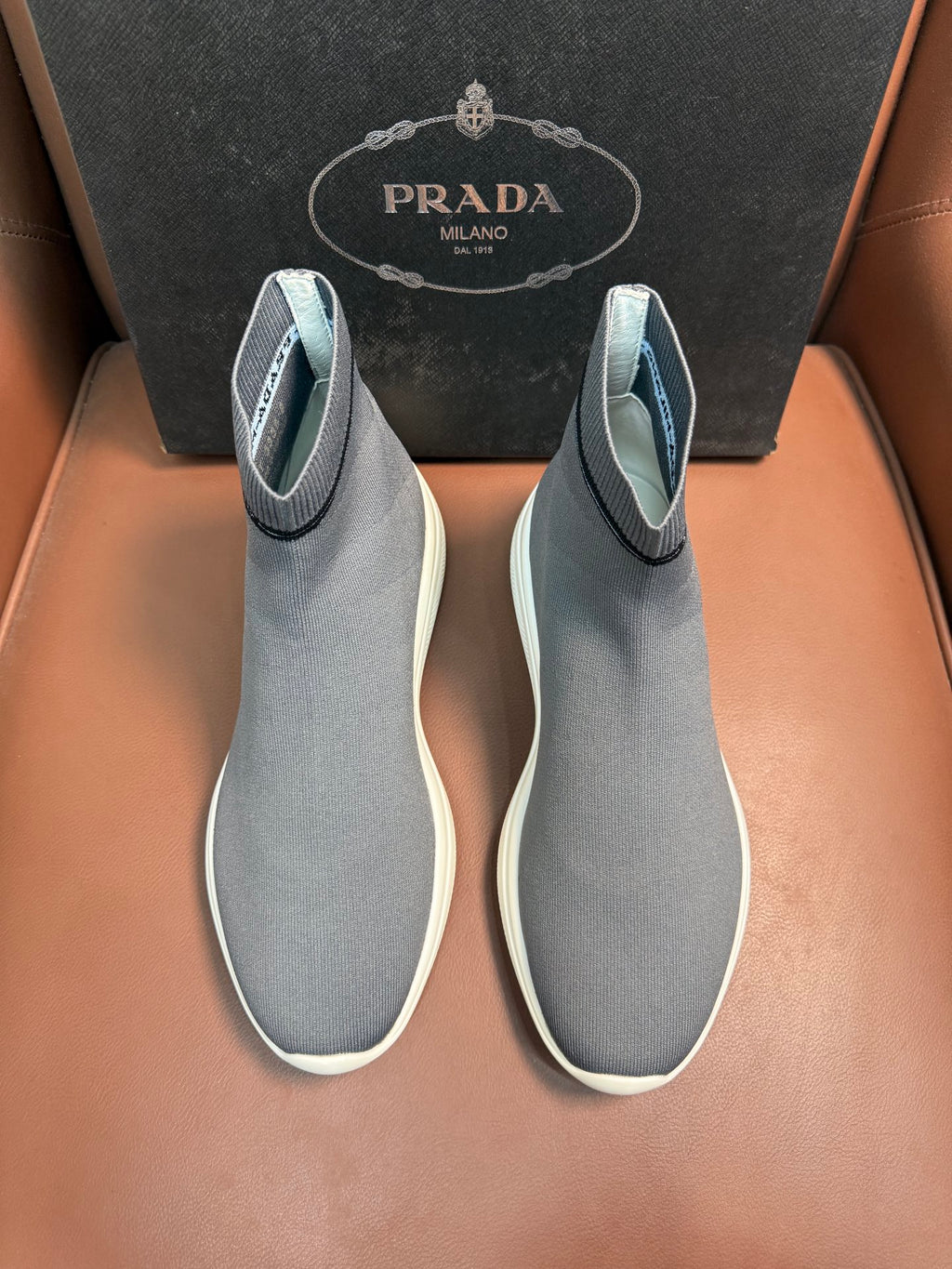 Prada unisex knit sock sneakers in light gray with white rubber sole