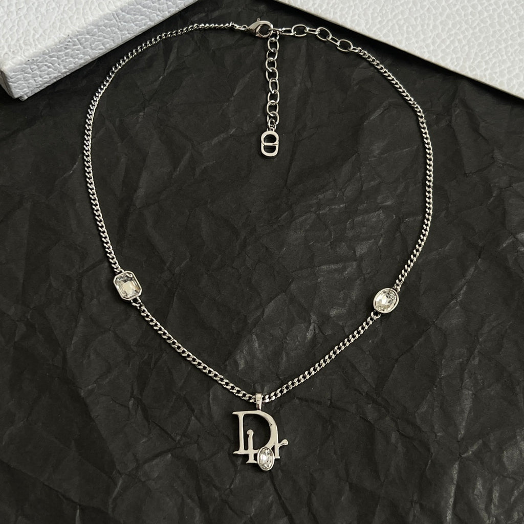 Silver-tone Dior charm necklace with central oval link and logo drop pendant
