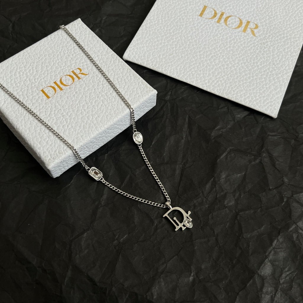 Silver-tone Dior charm necklace with oval gem links and logo pendant