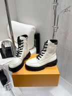 Louis Vuitton white high-top shoes, side view, black laces and rubber sole