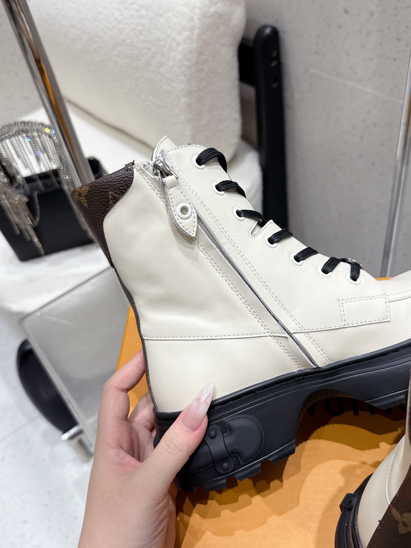 Louis Vuitton white zip high-top shoe, black laces and side zipper