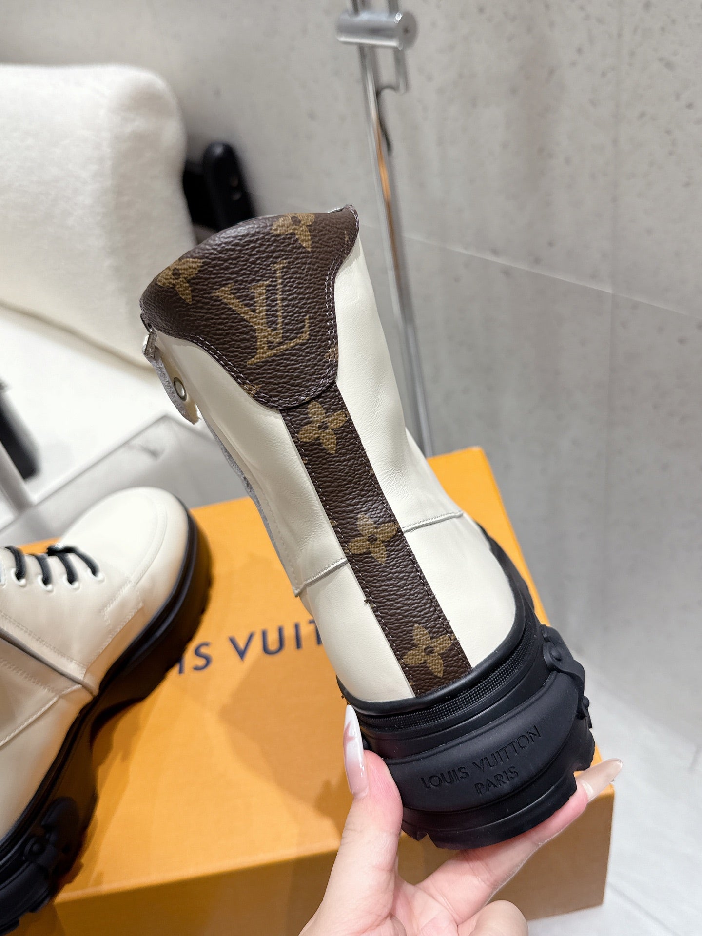 Louis Vuitton monogram high-top shoe with brown canvas and black rubber sole