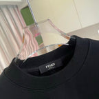 Long-sleeve crewneck sweatshirt, black, ribbed collar with inner brand tag.