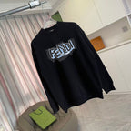 Long-sleeve crewneck sweatshirt, black, diagonal view with FENDI logo on chest.