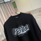 Long-sleeve crewneck sweatshirt, black, close-up of FENDI ROMA studded print.