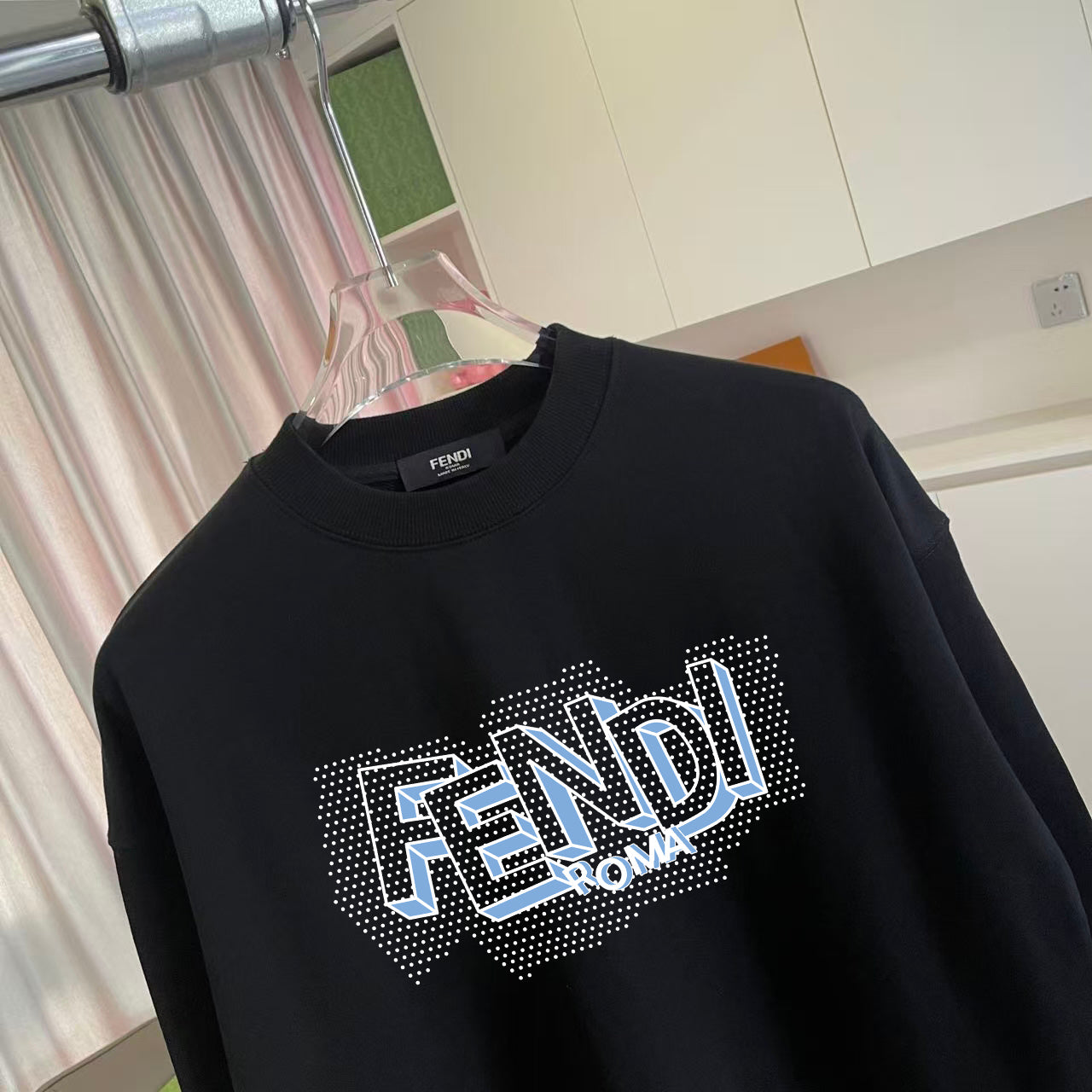 Long-sleeve crewneck sweatshirt, black, close-up of FENDI ROMA studded print.