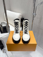 Louis Vuitton white high-top shoes with black laces on box