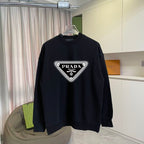Prada black long-sleeve sweatshirt with triangle logo patch