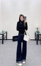 Louis Vuitton black long-sleeve mock-neck top with gold chain necklace detail