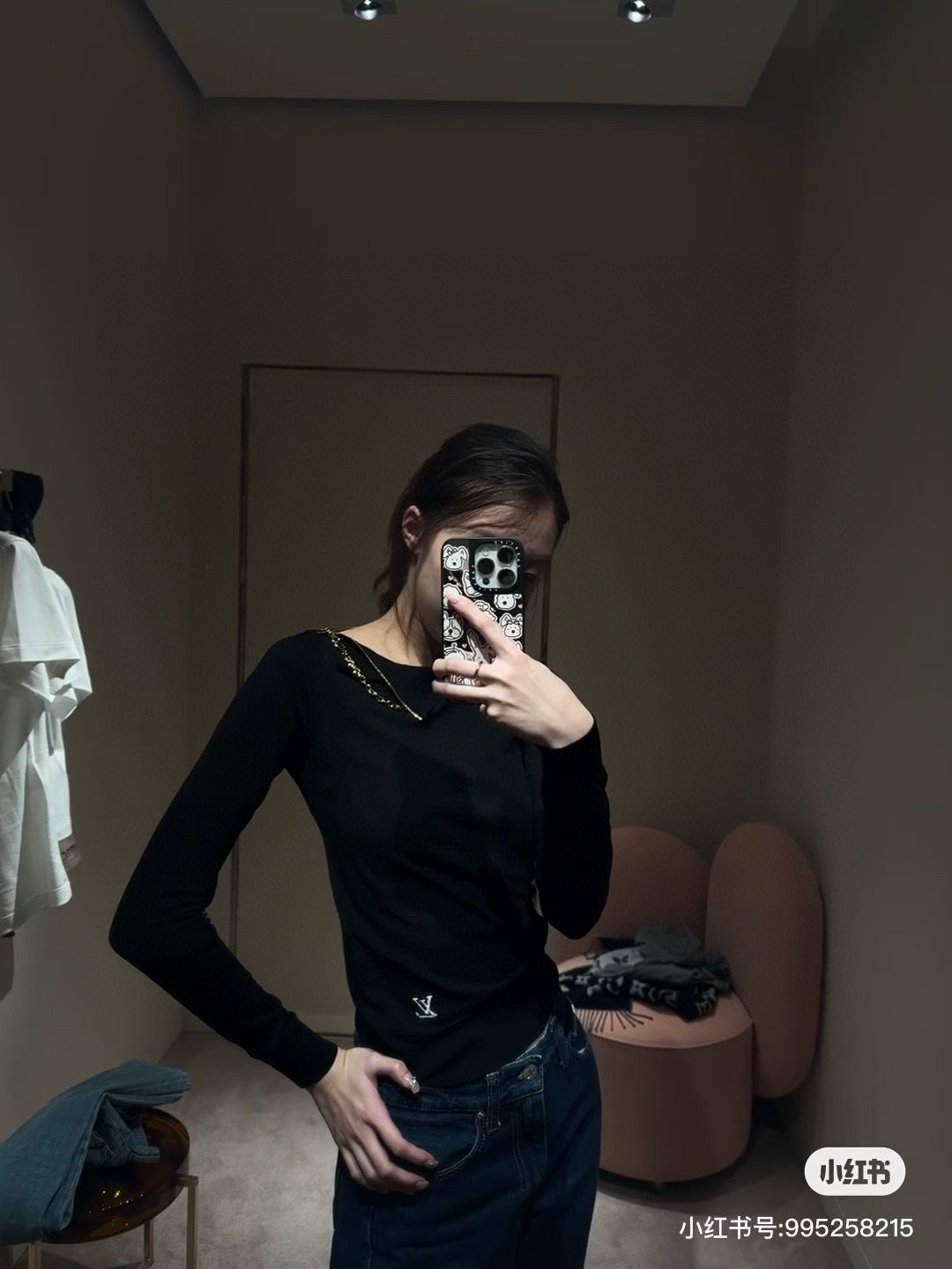 Louis Vuitton black long-sleeve mock-neck top with gold chain necklace detail