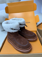 Louis Vuitton ladies shoes, brown suede with light blue shearling cuffs and tied lace, low profile sole.
