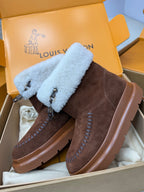 Louis Vuitton ladies shoes with brown suede, light blue shearling strap cuffs, platform rubber sole.