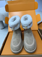 Louis Vuitton women's gray suede boots with light blue shearling cuffs and buckles