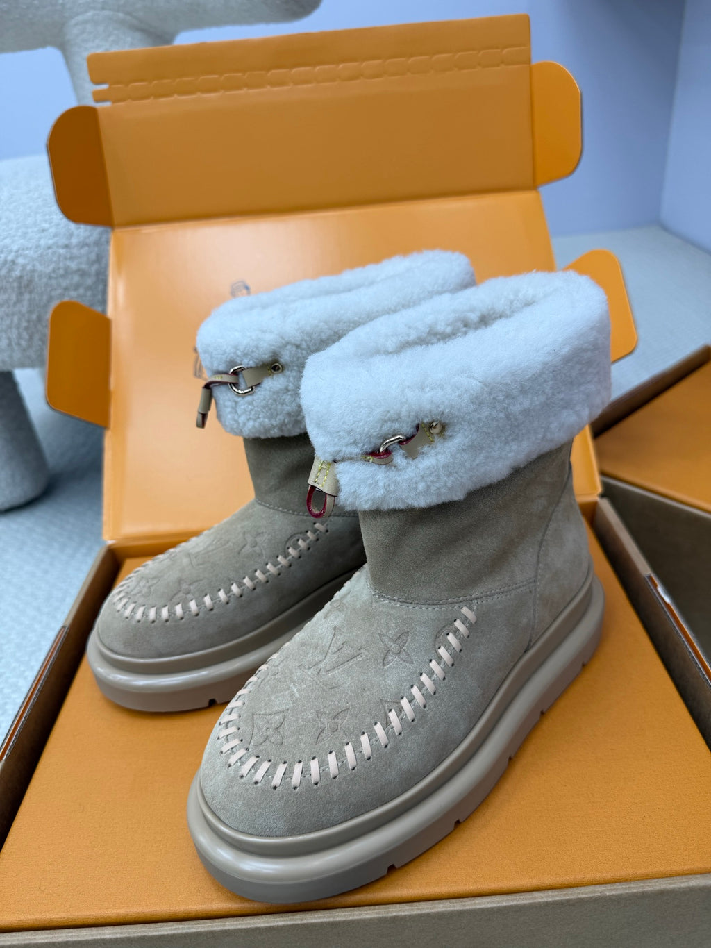 Louis Vuitton women's gray suede boots with light blue shearling cuff and contrast stitching