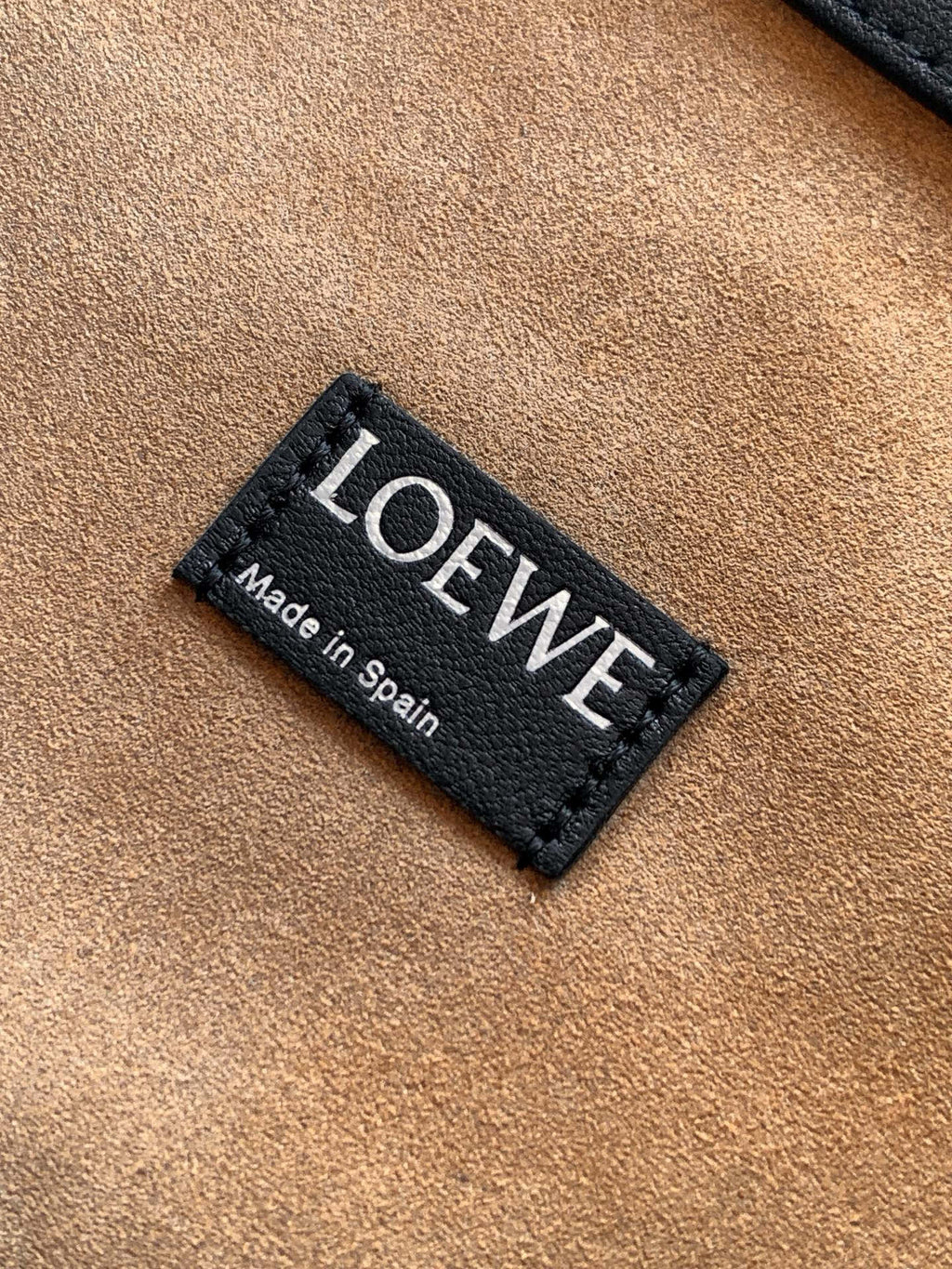 Loewe fabric label reading “LOEWE” and “Made in Spain”