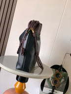 Loewe drawstring leather bag with braided cords and gold-tone hardware