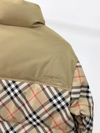 Burberry long jacket side view, beige top panel with multicolor plaid lower