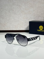 Versace aviator sunglasses with dark lenses and black frame with gold accents
