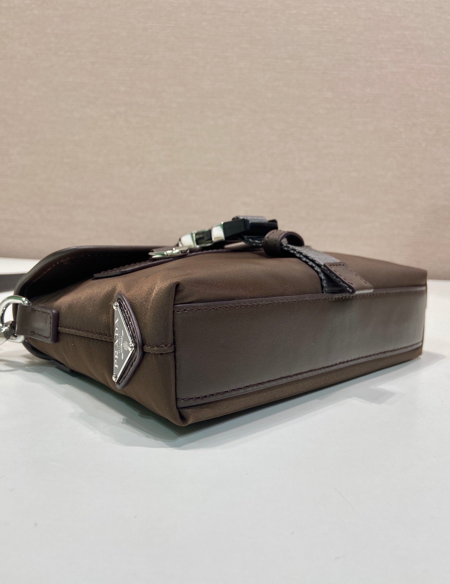 Prada dark brown nylon handbag with silver-tone hardware and top carry handle