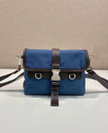 Prada blue crossbody bag with front flap and brown leather trim, buckles