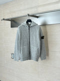 Stone Island knit zip hoodie with hood, light gray textured fabric, black zipper trim