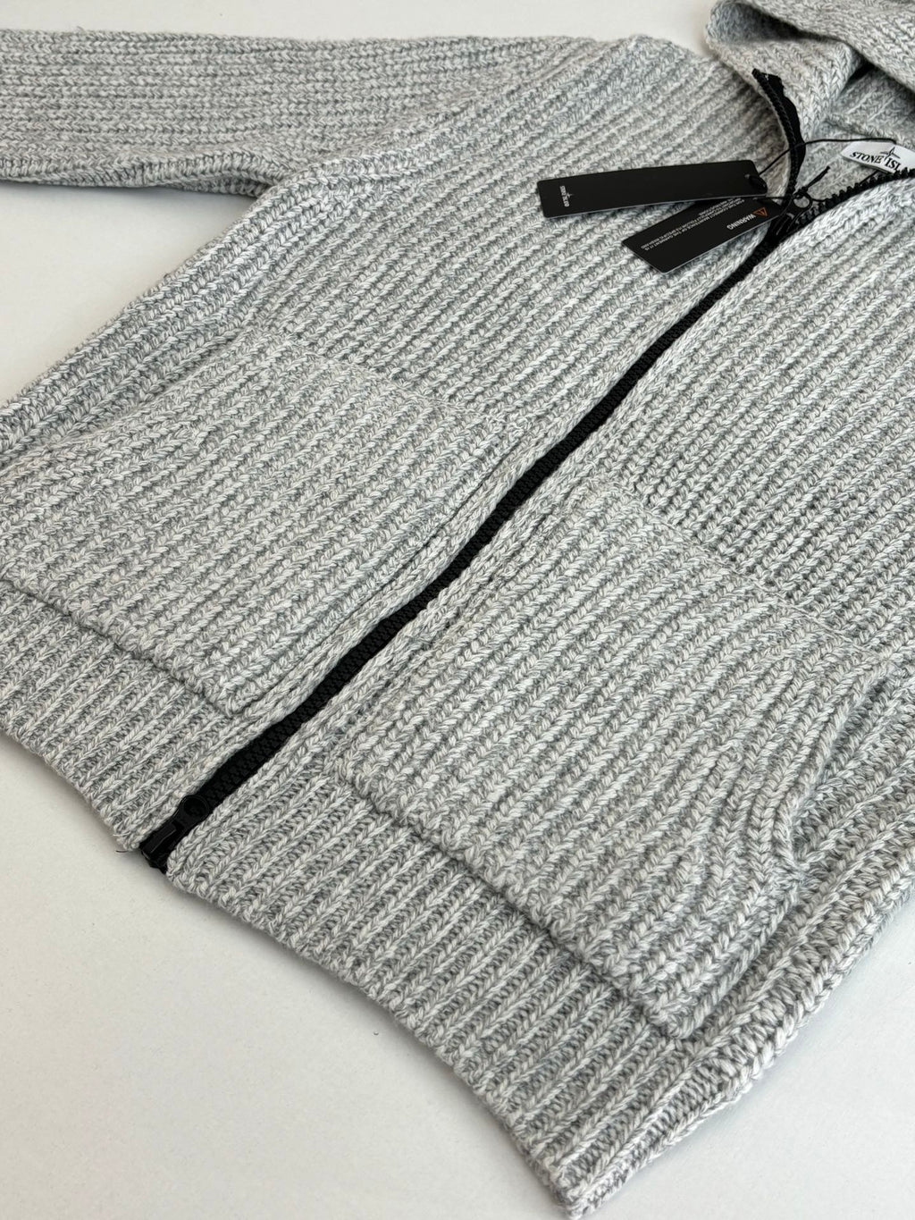Stone Island knit zip hoodie sleeves and front, light gray ribbed knit, black zipper seam