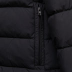 Black quilted puffer jacket front panel with centered zipper and stitched seams