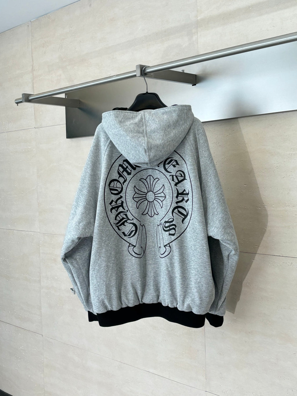 Heather gray zip-up hoodie with hood and large circular back graphic