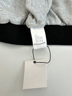 Hoodie neck label and hanging tag with black ribbed cuff