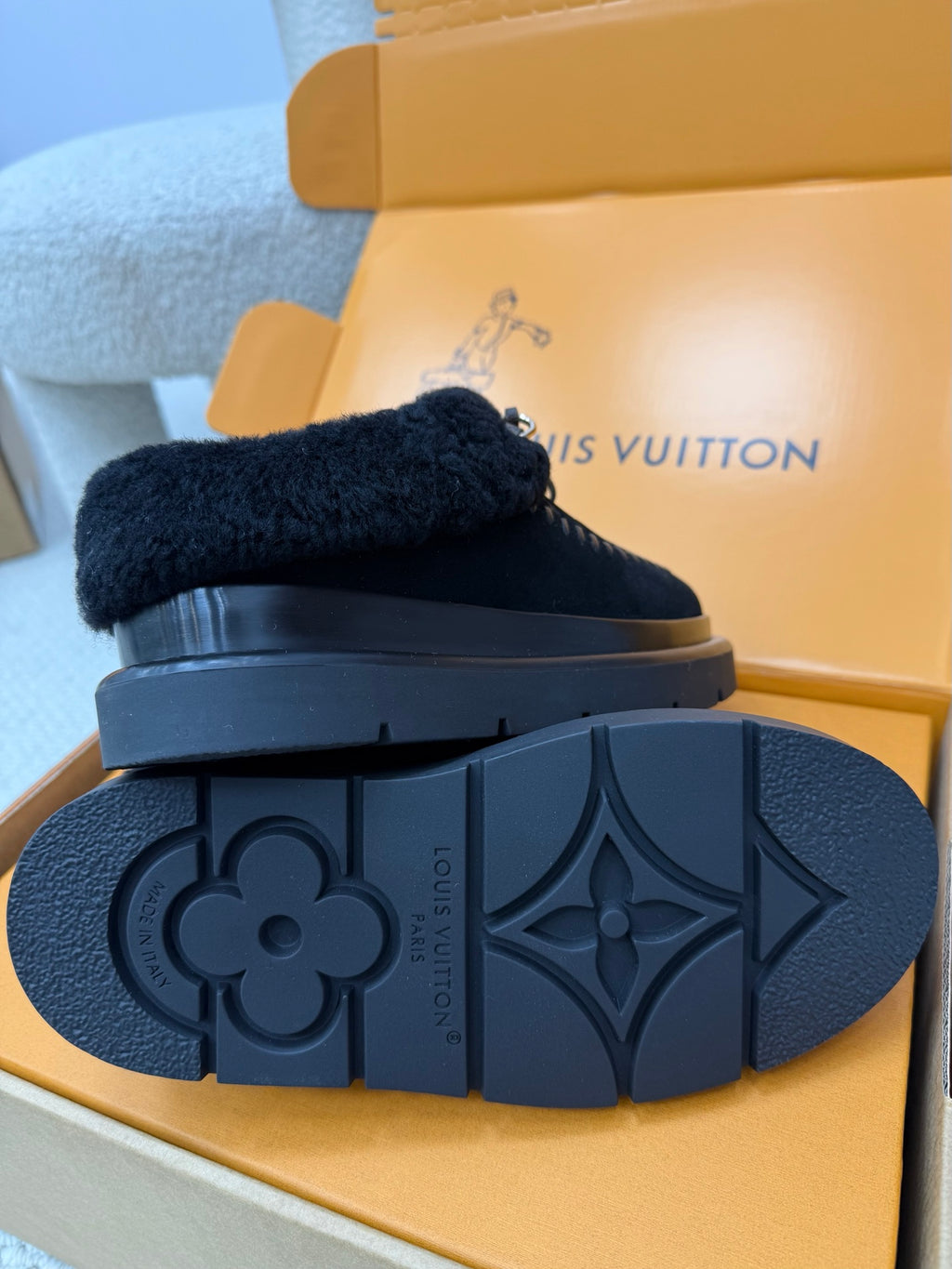 Ladies slide shoes outsole with molded tread and thick midsole, plush top