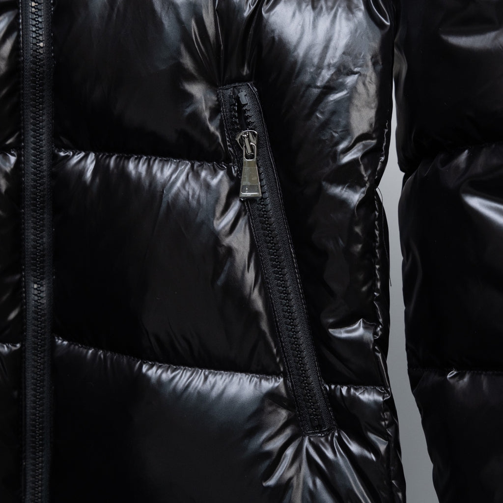 Moncler long puffer jacket front with zip and vertical seam