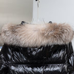 Moncler black hooded puffer coat with wide fur trim across the neckline