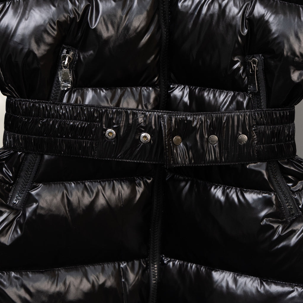 Moncler black puffer coat with belt, snap buttons, and front zipper placket