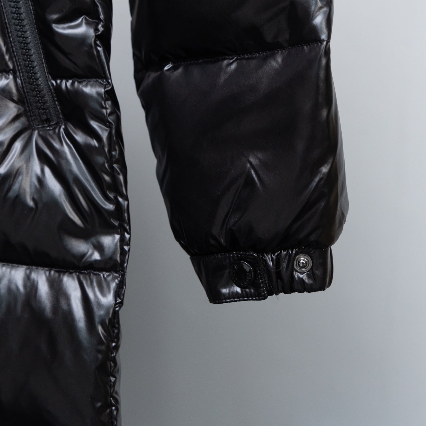 Moncler long puffer jacket sleeve cuff with snap buttons