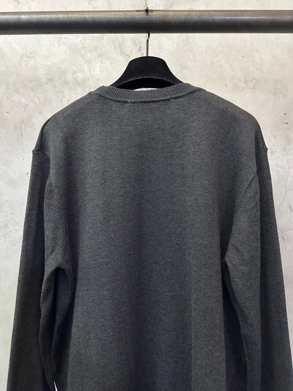 Dark gray long-sleeve sweater with ribbed crew collar, back view