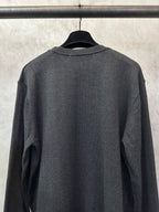 Dark gray long-sleeve sweater with ribbed crew collar, back view